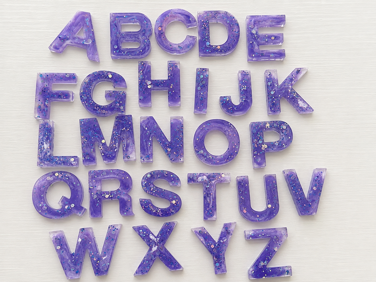 Full set of purple glitter resin alphabet letters